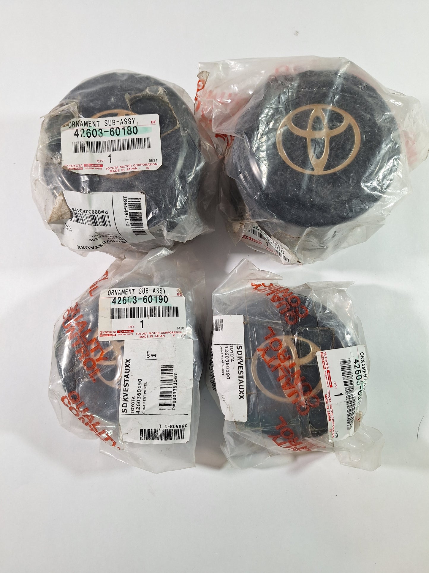 New Non/US 80 Series Wheel Center Hub Caps 42603-60180 and 42603-60190