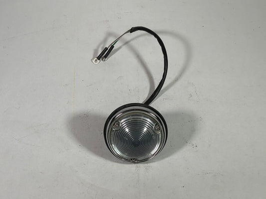 NOS Early FJ40 FJ45 clear bib turn signal light.