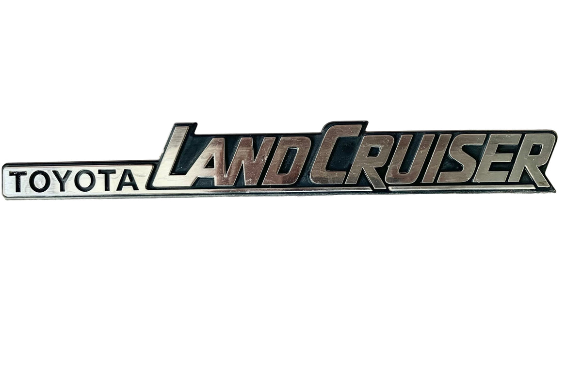 OEM Toyota 98-07 Land Cruiser J100 Rear VX Emblem Badge Chrome 75473-60040 OEM Toyota 98-07 Land Cruiser J100 Rear VX Emblem Badge Chrome 75473-60040