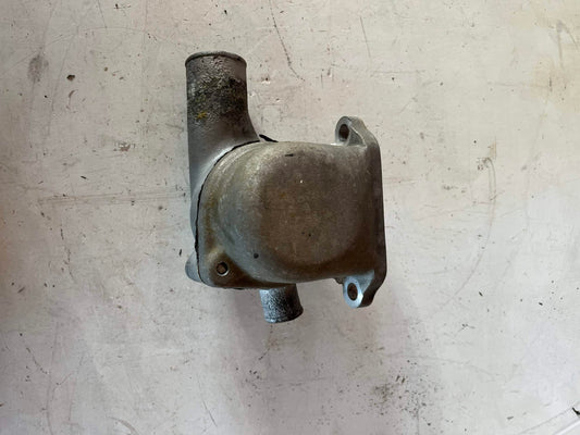 Used OEM FJ40 2F Thermostat Housing Assembly.